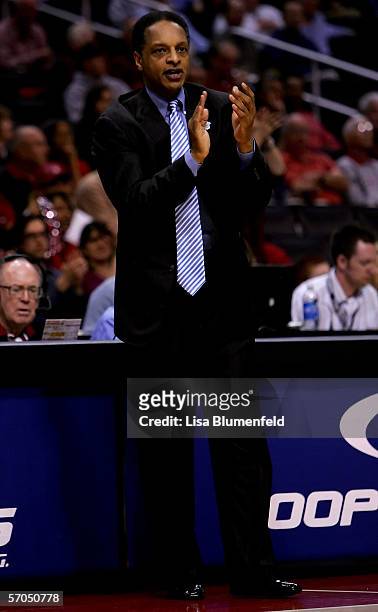 Head coach Trent Johnson of the Stanford Cardinal claps during the first half of the game against the Arizona Wildcats during the quarterfinals of...