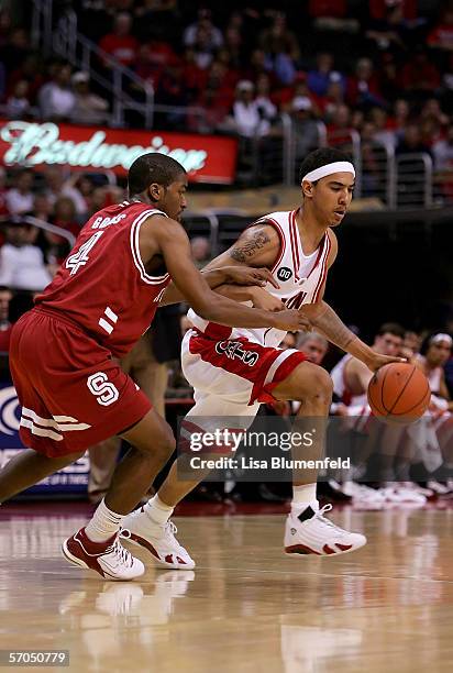 Marcus Williams of the Arizona Wildcats drives the ball past Anthony Goods of the Stanford Cardinal during the quarterfinals of the 2006 Pacific Life...