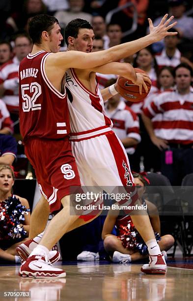 Ivan Radenovic of the Arizona Wildcats looks for an open pass under pressure from Matt Haryasz of the Stanford Cardinal during the quarterfinals of...