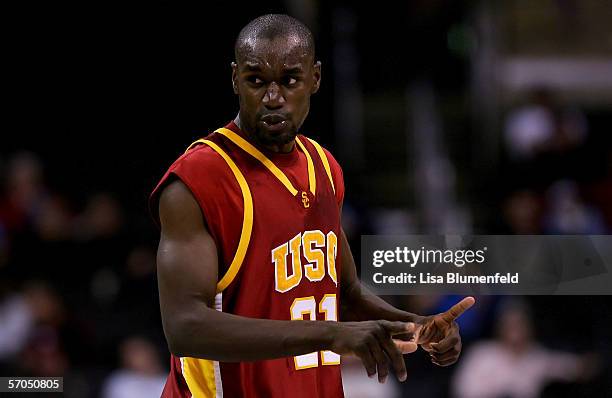 Abodoulaye Ndiaye of the USC Trojans gestures to his teammates during the second half of the game against the California Golden Bears in the...