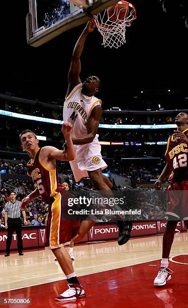 Leon Powe of the California Golden Bears puts a basket in over Dwayne Shackleford of the USC Trojans during the quarterfinals of the 2006 Pacific...