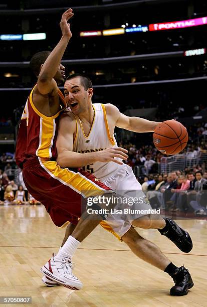 Eric Vierneisel of the California Golden Bears goes up against Gabriel Pruitt of the USC Trojans during the quarterfinals of the 2006 Pacific Life...