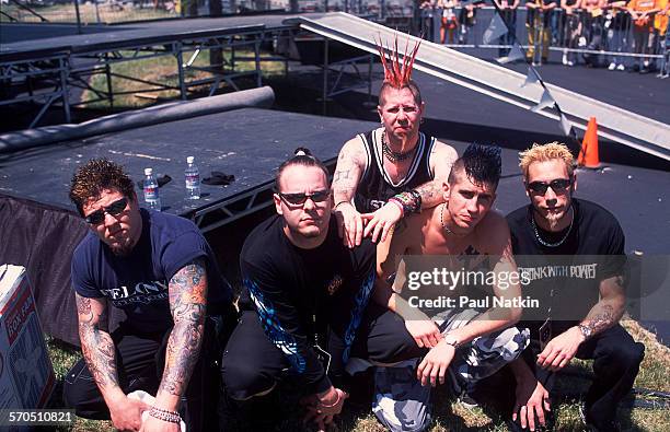 Portrait of American Nu Metal band From Zero as they pose together at the World Music Theater, Tinley Park, Illinois, May 2001.