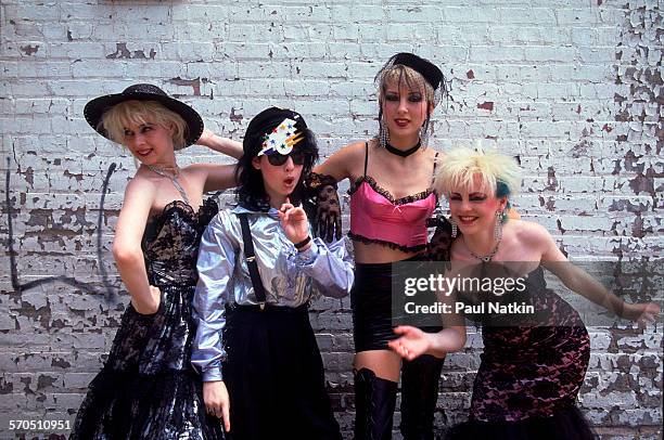 Portrait of British Pop-Punk group We've Got a Fuzzbox and We're Gonna Use It as they pose in front of a brick wall, Chicago, Illinois, June 7, 1987....