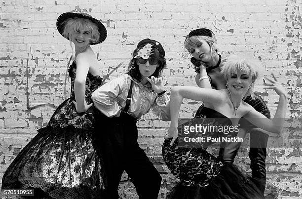Portrait of British Pop-Punk group We've Got a Fuzzbox and We're Gonna Use It as they pose in front of a brick wall, Chicago, Illinois, June 7, 1987....