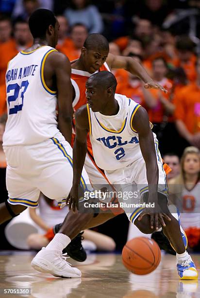 Darren Collison of the UCLA Bruins moves the ball around the outside during the game against the Oregon State Beavers in the quarterfinals of the...
