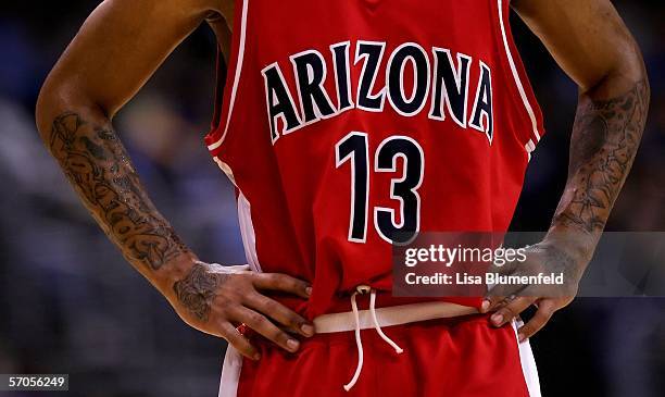 Detail shot of the tattoos of Chris Rodgers of the Arizona Wildcats during the final moments of their loss to the UCLA Bruins in the semifinals of...