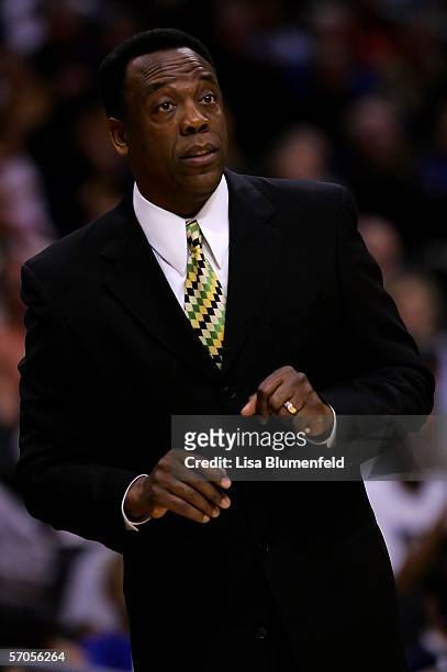 Head coach Ernie Kent of the Oregon Ducks watches from the sidelines in the first half of the semifinal game against the California Golden Bears in...