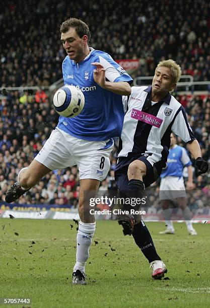 Martin Latka of Birmingham City is tackled by Junichi Inamoto of West Bromwich Albion during the Barclays Premiership match between Birmingham City...