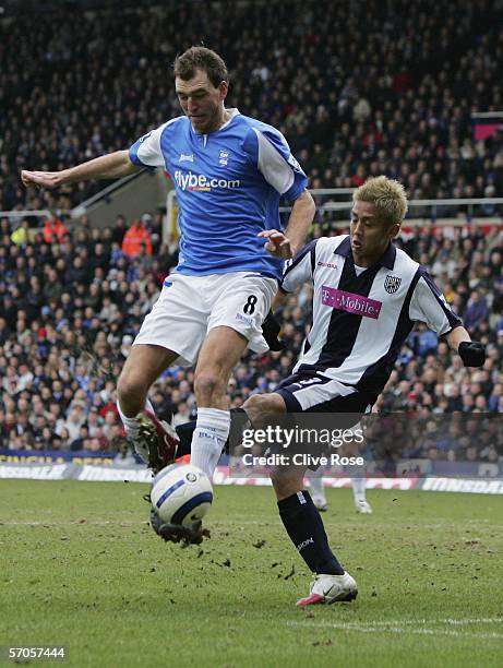 Martin Latka of Birmingham City is tackled by Junichi Inamoto of West Bromwich Albion during the Barclays Premiership match between Birmingham City...