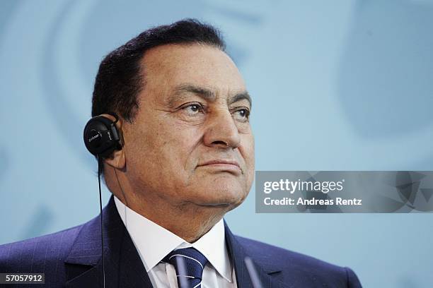 Egyptian President Hosni Mubarak looks on during a press conference at the Chancellery on March 11, 2006 in Berlin, Germany. German Chancellor Angela...