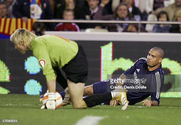 Ronaldo of Real Madrid loses the ball to Santiago Canizarez of Valencia during a Primera Liga match at the Mestalla stadium on March 11, 2006 in...
