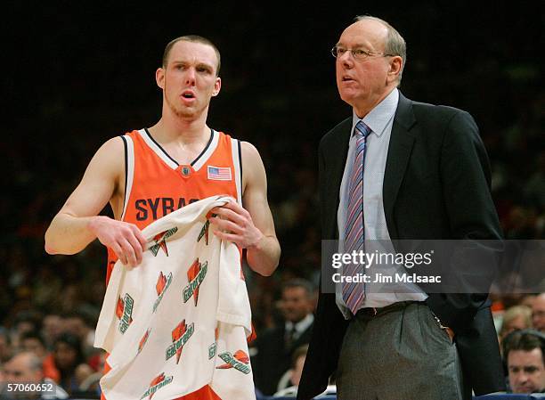 Gerry McNamara and head coach Jim Boeheim of the Syracuse Orange look on from the bench during the Big East Men's Basketball Championship Final...