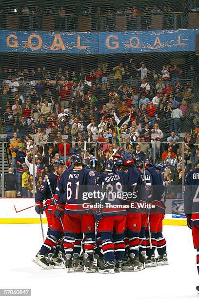 The Columbus Blue Jackets celebrate their sudden death win against the Edmonton Oilers at Nationwide Arena on March 11, 2006 in Columbus, OH....