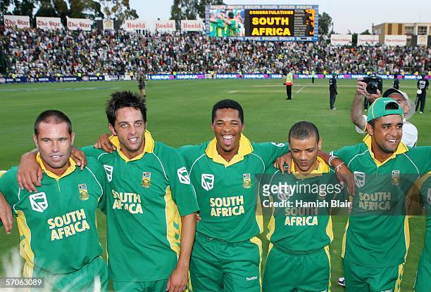 The South African team celebrate their win during the fifth One Day International between South Africa and Australia played at Wanderers Stadium on...