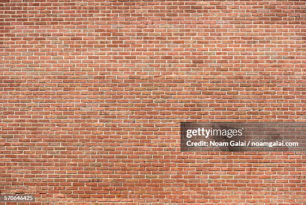 large brick wall - new york city wall stock pictures, royalty-free photos & images