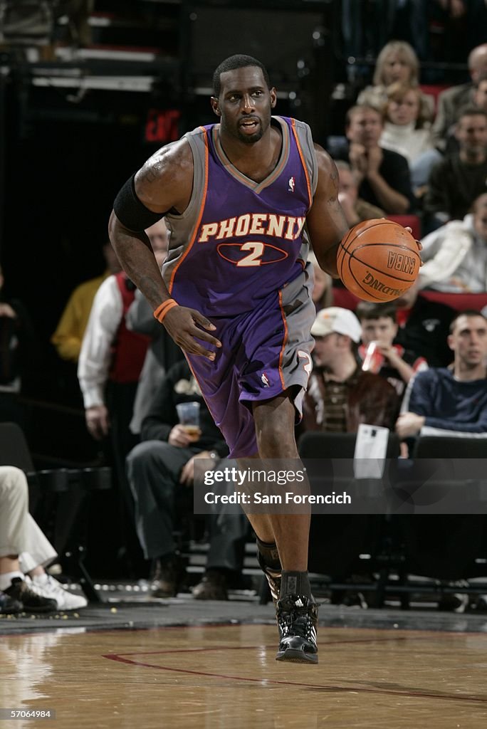 Tim Driver Phoenix Tim Thomas of the Phoenix Suns drives against the Portland Trail ...