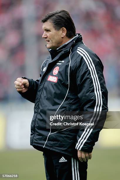 Head coach Hans Meyer of Nuremberg looks on during the Bundesliga match between 1. FC Cologne and 1. FC Nuremberg at the Rhein Energie Stadium on...