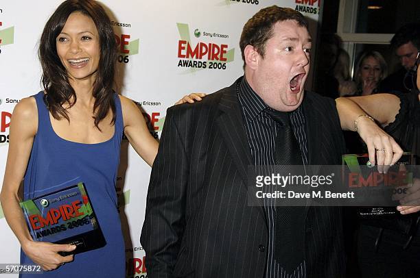 Actors Johnny Vegas and Thandie Newton pose in the awards room with the award for Best Actor for Johnny Depp in "Charlie and the Chocolate Factory"...