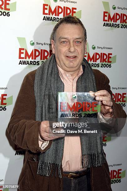 Director Stephen Frears poses in the awards room with the The Empire Inspiration Award at the Sony Ericsson Empire Film Awards 2006, the annual...