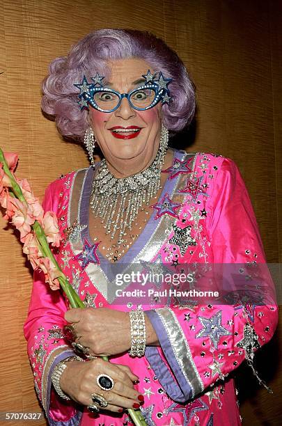 Dame Edna waits for her cue to surprise playwright Horton Foote as he is honored by the Signature Theatre Company on the eve of his 90th birthday at...