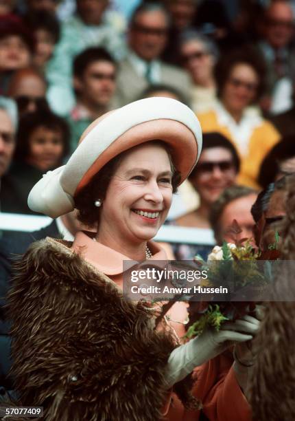 Queen Elizabeth II wearing a Maori cloak during a visit New Zealand in 1977 on her Silver Jubilee tour.