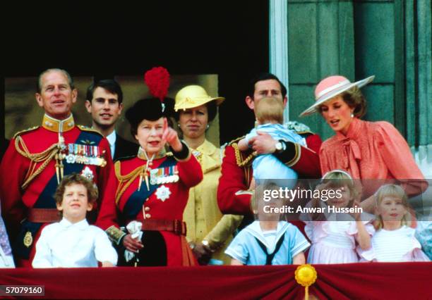 Prince Philip, Duke of Edinburgh, Prince Edward, Queen Elizabeth II, Anne, Princess Royal, Prince Charles, Prince of Wales holding Prince Harry,...