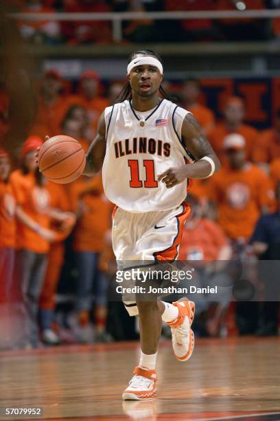 Dee Brown of the Illinois Fighting Illini drives down court against the Indiana Hoosiers on February 19, 2006 at the Assembly Hall at the University...