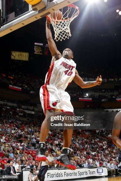 Udonis Haslem of the Miami Heat dunks against the Utah Jazz on March 14, 2006 at American Airlines Arena in Miami, Florida. NOTE TO USER: User...