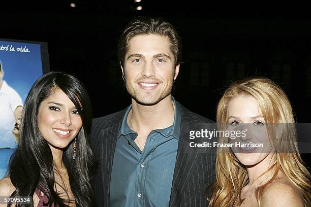 Actress Roselyn Sanchez poses with Eric Winter,actor and Poppy Montgomery,actress at the Premiere Of "Cayo" at the Harmoney Gold Theatre on March 14,...