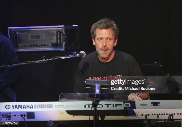 Actor Hugh Laurie of 16:9 performs at the "Evening with Ray Kennedy and Friends" hosted by the Guitar Center Music Foundation at the Avalon on March...