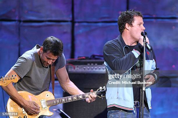 Actor James Denton and actor Bob Guinney of 16:9 perform at the "Evening with Ray Kennedy and Friends" hosted by the Guitar Center Music Foundation...