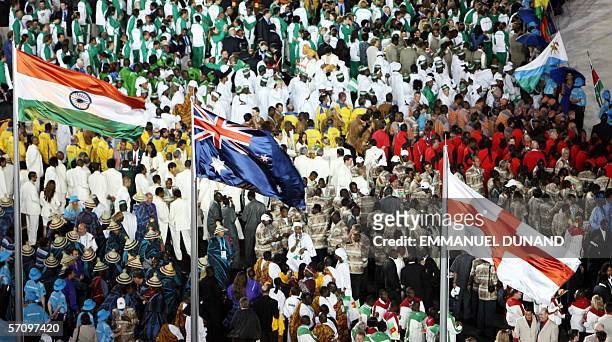 The national flags of India, Australia and England flutter over athletes the opening ceremony of the Commonwealth Games 2006 at the Melbourne Cricket...