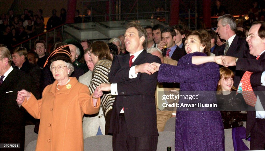 GBR: Queen Elizabeth II, British Prime Minister Tony Blair, and his wife Cherie Blair during the Millenium New Year celebrations