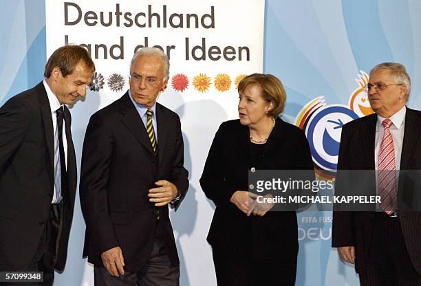 German head coach Juergen Klinsmann, Franz Beckenbauer, president of the German World Cup Organizing Committee, German Chancellor Angela Merkel and...