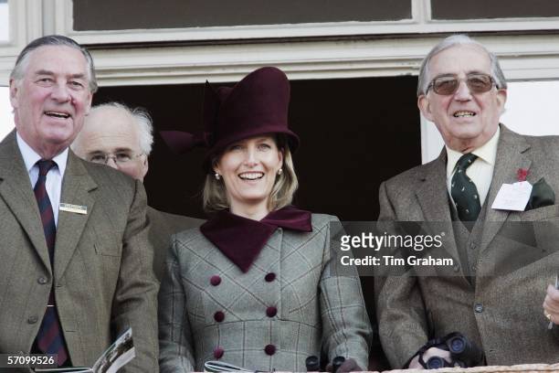 Lord Sam Vestey, Sophie Rhys-Jones, Countess of Wessex and Christopher Rhys-Jones watch the Queen Mother Championship Chase on the second day of...