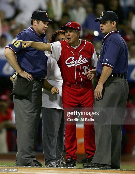 Manager Higinio Velez of Cuba argues with the umpires in the game against Puerto Rico during Round 2 of the World Baseball Classic on March 15, 2006...