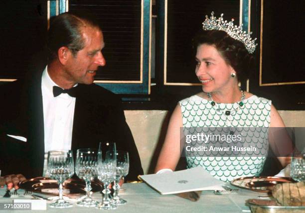 Queen Elizabeth II and Prince Philip, the Duke of Edinburgh at a State banquet in 1970.