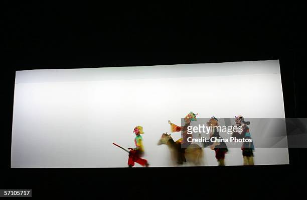 Chinese Shadow Play "Journey to the West" is performed during the Golden Lion Award National Puppet and Shadow Play Competition on March 16, 2006 in...