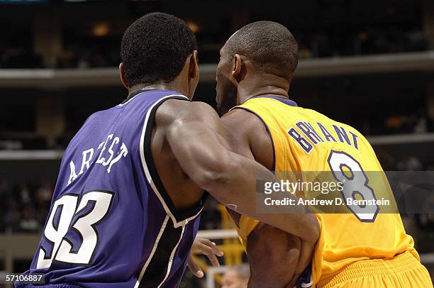 Ron Artest of the Sacramento Kings guards Kobe Bryant of the Los Angeles Lakers on February 23, 2006 at Staples Center in Los Angeles, California....