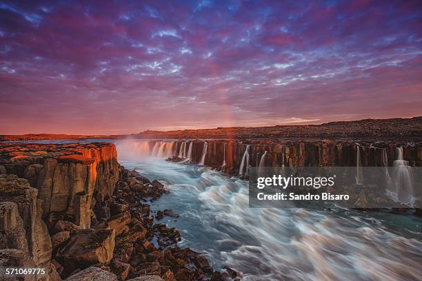 selfoss waterfall sunset with rainbow - selfoss stock pictures, royalty-free photos & images