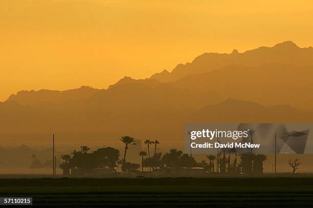 Rugged mountains rising east of the flat farmland of the Colorado River basin provide more remote and dangerous alternative routes for illegal...