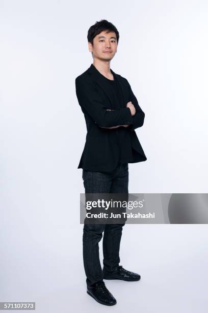 portrait of japanese man - black trousers stockfoto's en -beelden