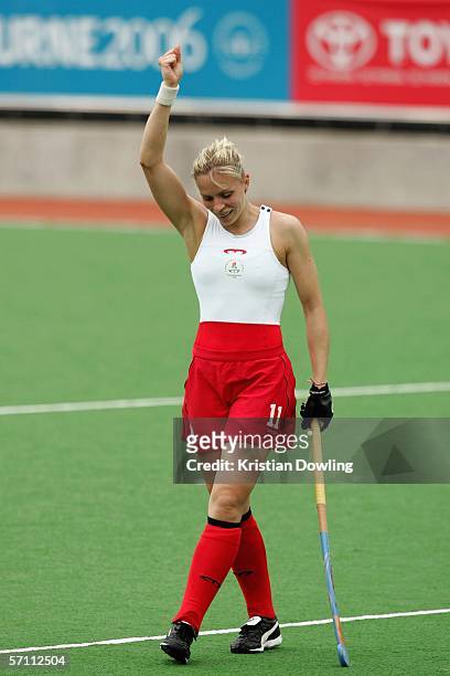 Louise Kate Walsh of England celebrates a goal during the Women's Hockey match between England and Canada during day 2 of the Melbourne 2006...