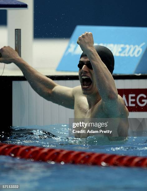 Matthew Clay of England celebrates winning the men's 50m backstroke final during the swimming at the Melbourne Sports & Aquatic Centre during day two...