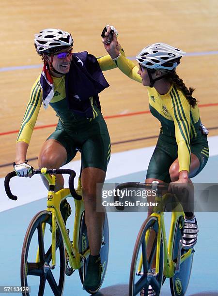 Katherin Bates of Australia celebrates victory with Rochelle Gilmore of Australia after the Women's Point Race Final during track cycling at the...