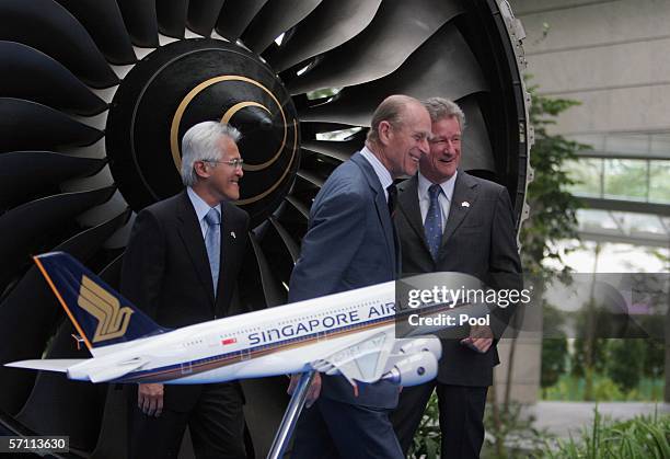 Chew Choon Seng, Chief Excecutive of Singapore International Airlines, Prince Philip , Duke of Edinburgh, Jonathan Asherson, Regional Director of...