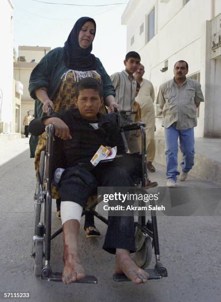An Iraqi Shiite pilgrim injured by gunmen is seen on March 17, 2006 at a hospital in Baghdad, Iraq. Three people were killed and two were wounded...
