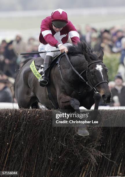 Jockey Connor O'Dwyer riding War of Attrition win The Totesport Cheltenham Gold Cup Steeple Chase during the Cheltenham Festival Day 4 at Cheltenham...