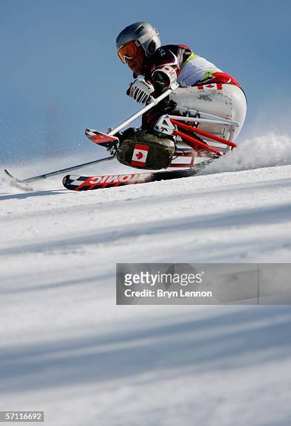 Jeffery Penner of Canada competes in the Men's Giant Slalom - Sitting during Day Seven of the Turin 2006 Winter Paralympic Games on March 17, 2006 in...